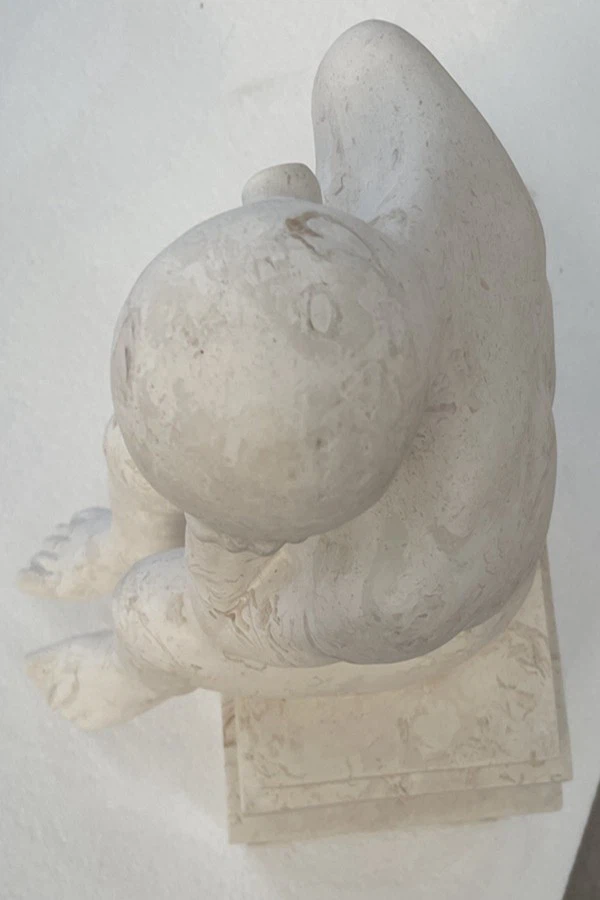 Limestone male statue